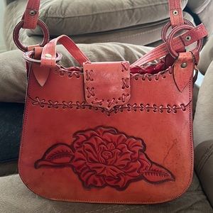 Red hard leather purse